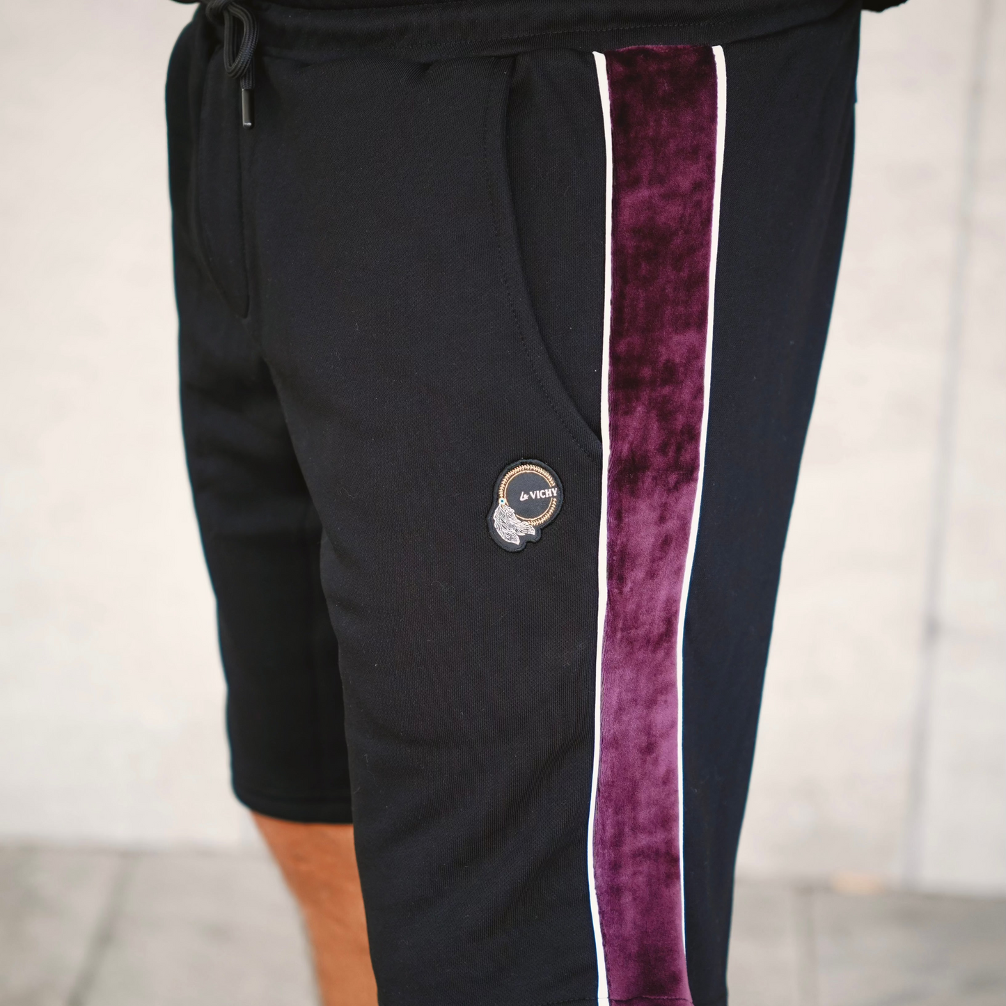 Black Shorts With Purple Stripe